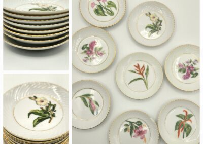 Set of decorative plates featuring floral designs.