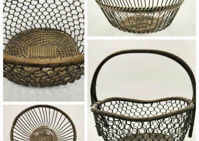 A rustic woven basket with a sturdy handle and open weave design.