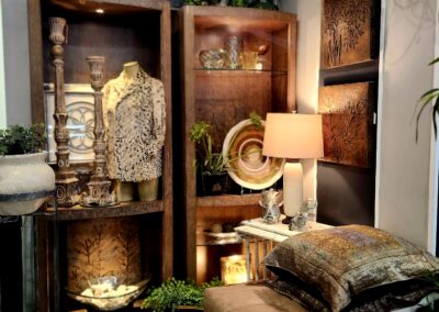 Cozy corner with vintage decor, warm lighting, and plush cushions.
