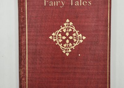 A vintage red hardcover book titled 'Andersen's Fairy Tales' by Hans Andersen.