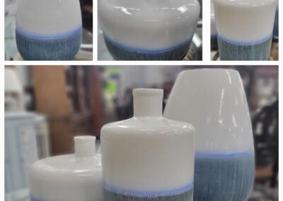 Three ceramic containers with lids, featuring a blue and white glaze.