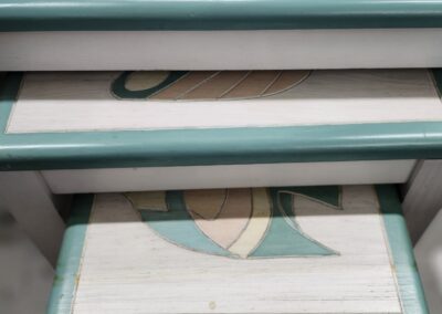 Open drawer showing a patterned fabric inside.