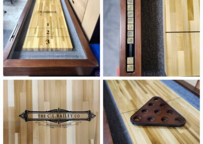 A custom wooden billiards table with unique design and accessories.