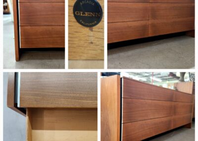 Wooden sideboard with clean lines and storage drawers.