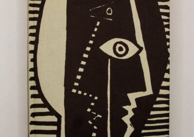 Abstract black and white face profile with geometric patterns.