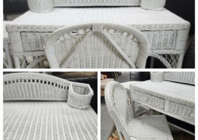 Elegant white wicker furniture set with intricate details.