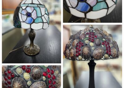 A stained glass Tiffany-style lamp with floral motifs and colorful glass pieces.