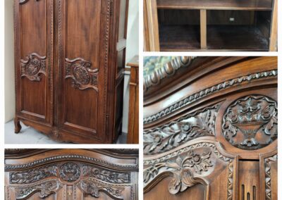 Intricately carved wooden cabinet with floral and ornamental designs.