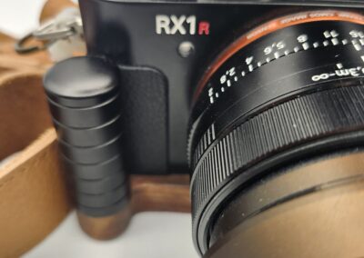 Close-up of a vintage Sony RX1 camera with lens details.