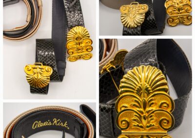 Elegant black belts with intricate golden buckles featuring classical designs.