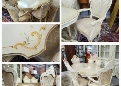 Elegant vintage white and gold dining set with ornate chairs and a detailed table.