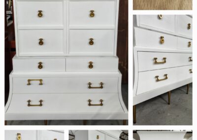White wooden dresser with multiple drawers and brass handles.