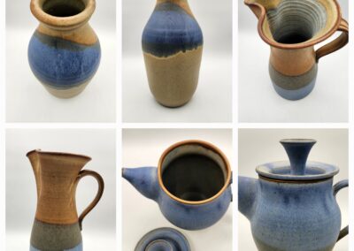 Set of rustic ceramic pitchers with blue and beige glaze.