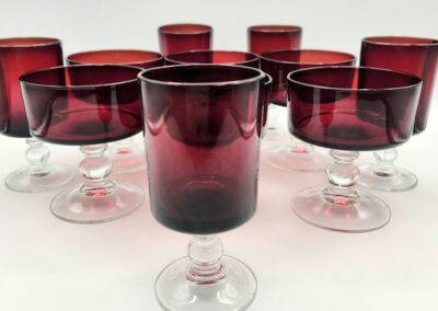 Set of elegant red and clear glass goblets with a vintage style.