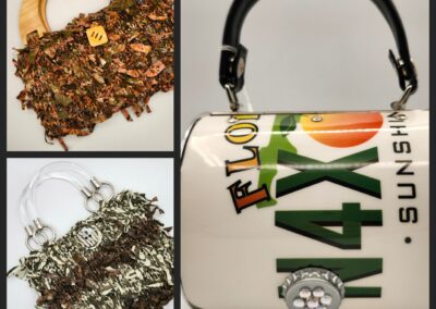 Three stylish handbags with unique designs and embellishments.