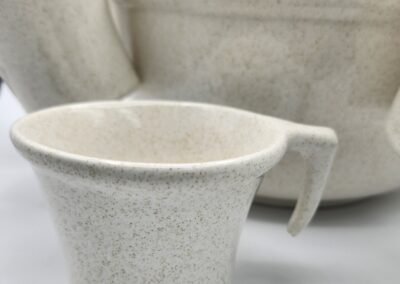 Speckled ceramic bowls and cup set.