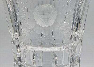 Crystal vase with engraved geometric pattern.