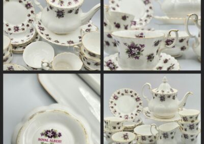 Floral porcelain tea set with purple flowers.