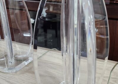 Transparent acrylic lamp with sleek modern design.