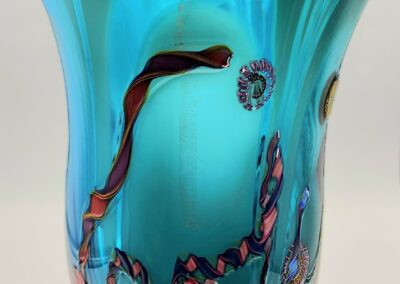 Blue and turquoise decorative glass vase.