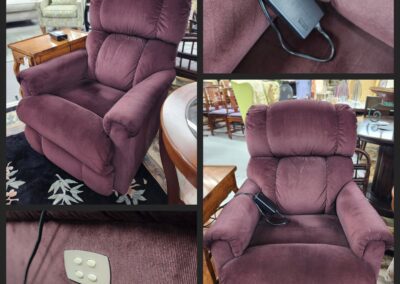 Purple recliner chair with control panel.