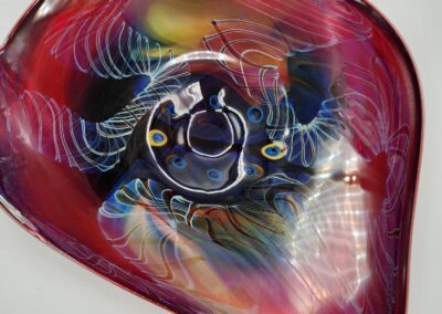 Colorful abstract glass art with intricate patterns.
