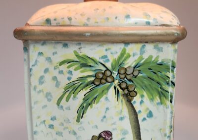 Decorative lamp with monkey and palm tree.