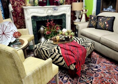 Eclectic living room with ornate decorations.