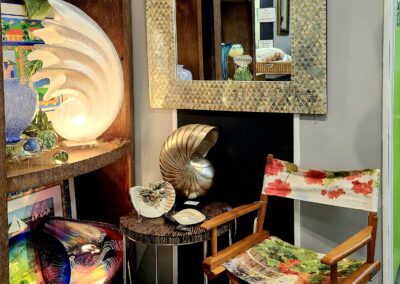 Eclectic room corner with chair and mirror.