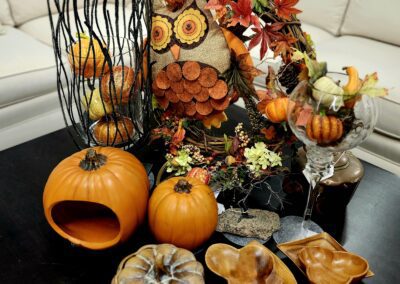 Autumn-themed decorations with pumpkins and owl.
