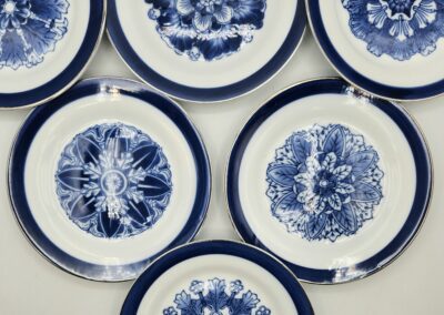 Blue floral patterned plates on display.