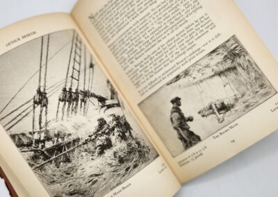 Open book showing black and white illustrations.