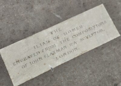 Marble plaque with engraved text.