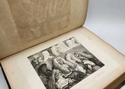 Open book with detailed historical illustration.