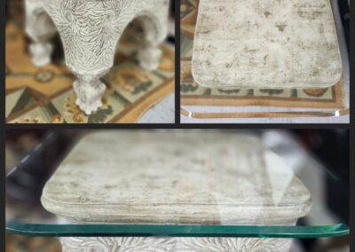 Decorative stone table with glass top.