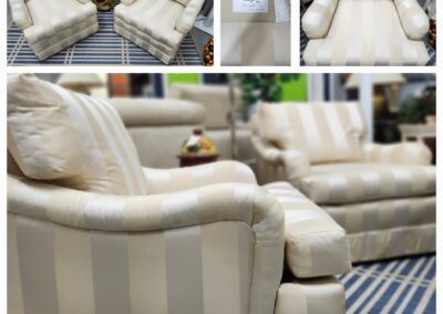 Striped beige armchairs in a living room.