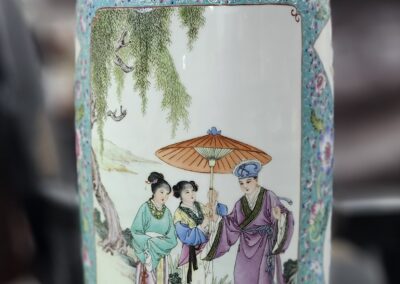 Decorative vase with traditional Asian painting.