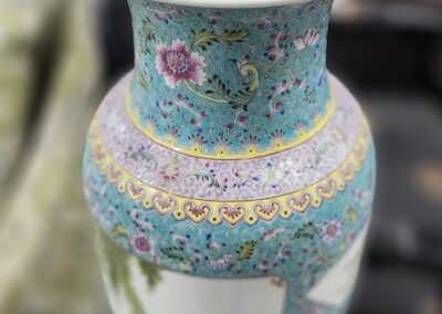 Ornate ceramic vase with floral patterns.