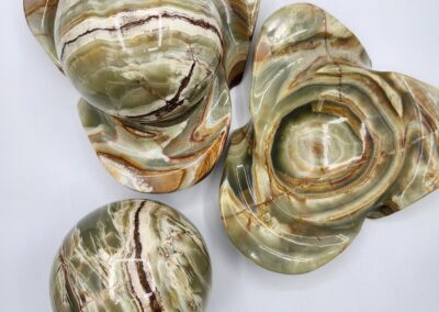 Polished green onyx plates and bowls.