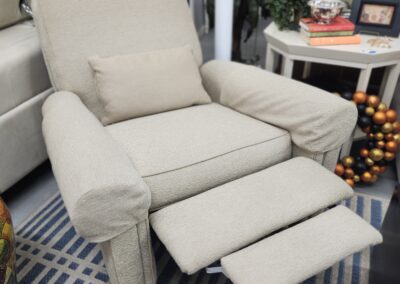 Beige recliner chair in a living room.