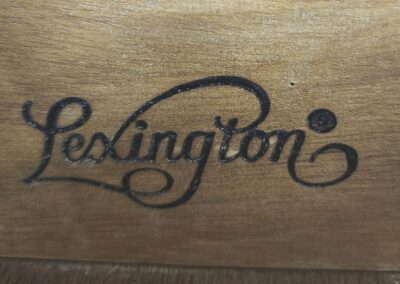 Lexington" logo on wooden surface.