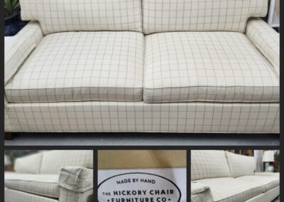 Plaid sofa with beige checkered pattern.