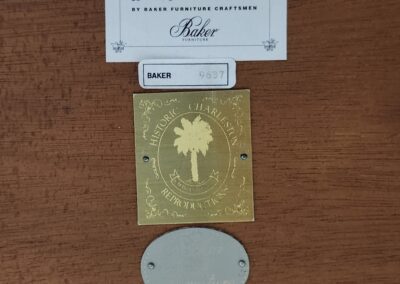 Plaques and labels on wooden surface.