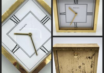 Gold square clock with Roman numerals.