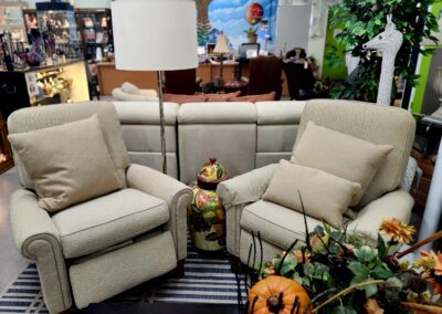 Cozy living room with armchairs and decor.
