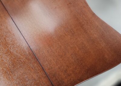 Wooden table with a polished brown finish.