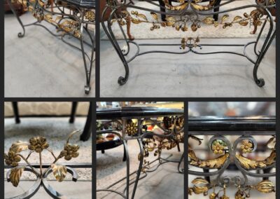 Ornate metal table with intricate floral design.