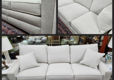 Light gray sofa with decorative pillows.