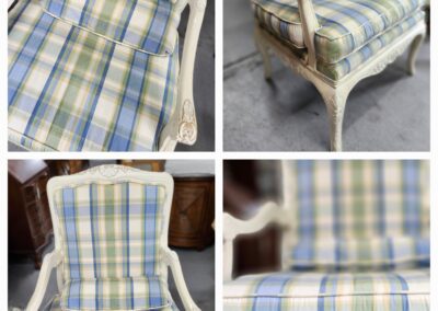 Plaid upholstered chairs with ornate wooden frames.