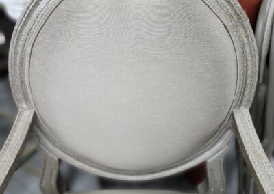 Elegant vintage chair with floral carving.